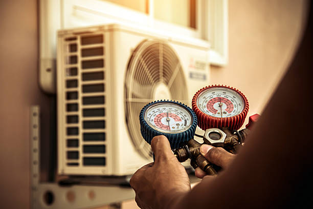 Professional Ac Installation technician working in Lacona, IA